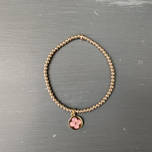 3mm gold filled bracelet with raised flower charm