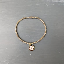 3mm gold filled bracelet with raised flower charm