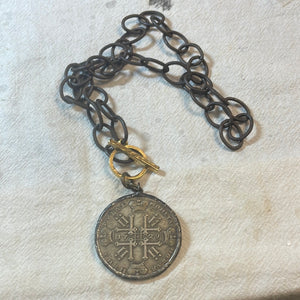 Replica dollar pendant with antique toggle necklace
