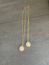 St Christopher necklace.
