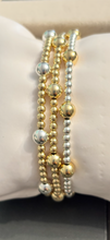 3mm gold filled bracelet w/ 8 6mm gold filled beads