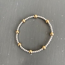 3mm gold filled bracelet w/ 8 6mm gold filled beads