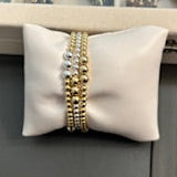 4mm gold filled bracelet w/ 9 6mm gold filled beads