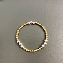 4mm gold filled bracelet w/ 9 6mm gold filled beads