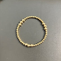 4mm gold filled bracelet w/ 9 6mm gold filled beads