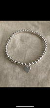 Sterling Silver bracelet with choice of charm