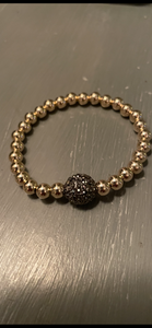 Hematite and gold bracelet
