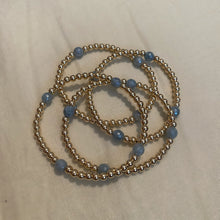 4mm 14k gold filled beaded bracelet with blue aquamarine beads.