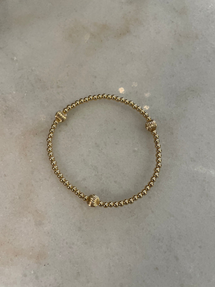3mm gold filled bracelet w/ 3 large corrugated beads
