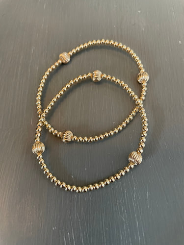 3mm gold filled bracelet w/ 3 large corrugated beads