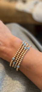 4mm 14k gold filled beaded bracelet with blue aquamarine beads.