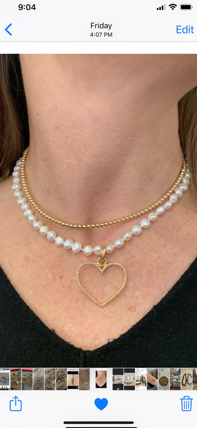 Pearl necklace with gold diamond heart