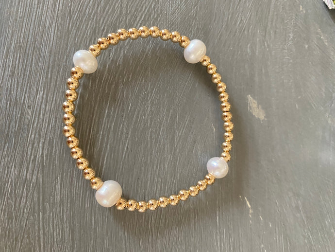 4mm gold filled bracelet w/ 4 white pearls